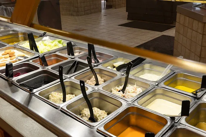 Hot lunch buffet spread at Carolina Fine Foods